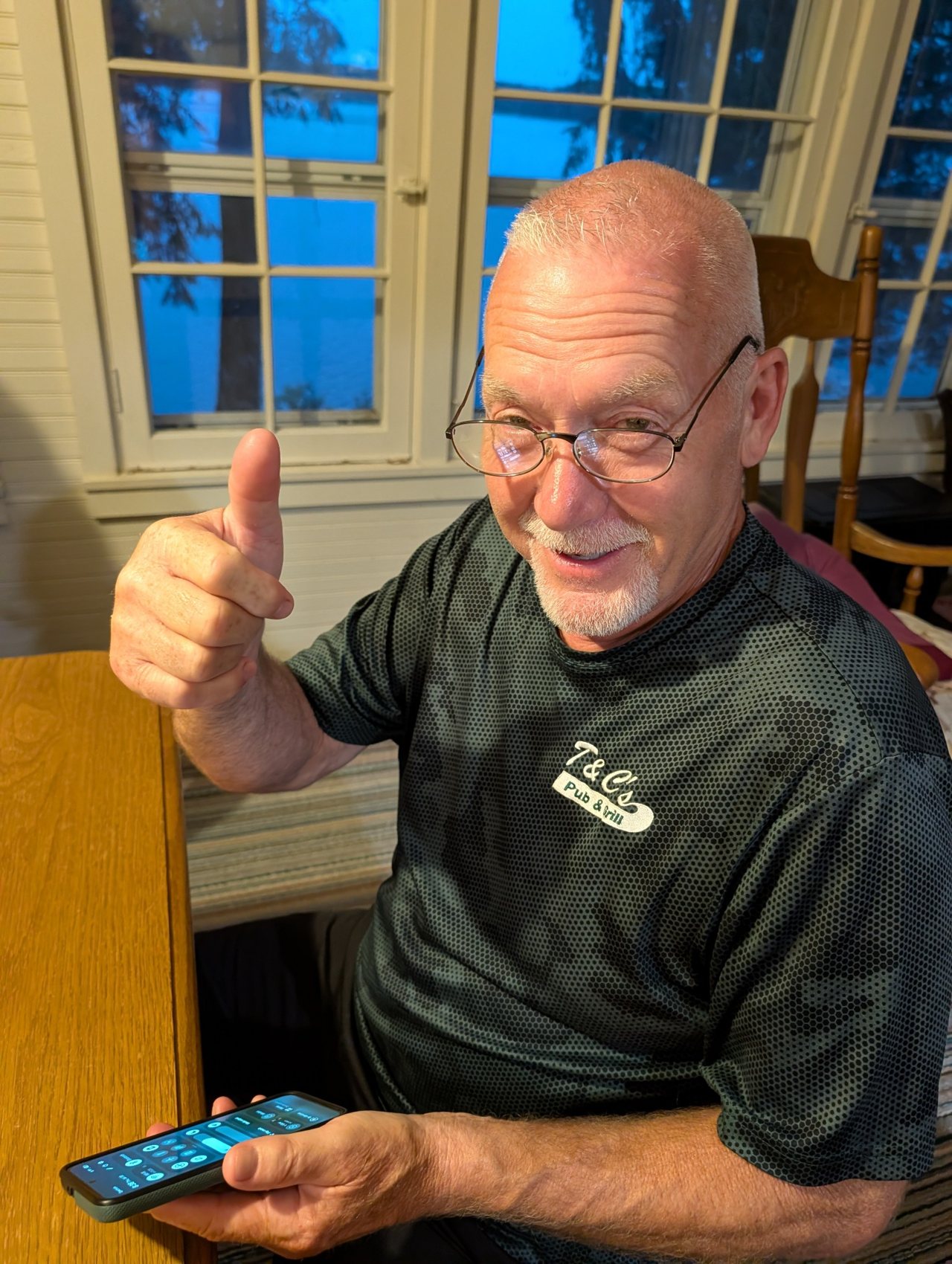 Todd smiling and giving a thumbs-up